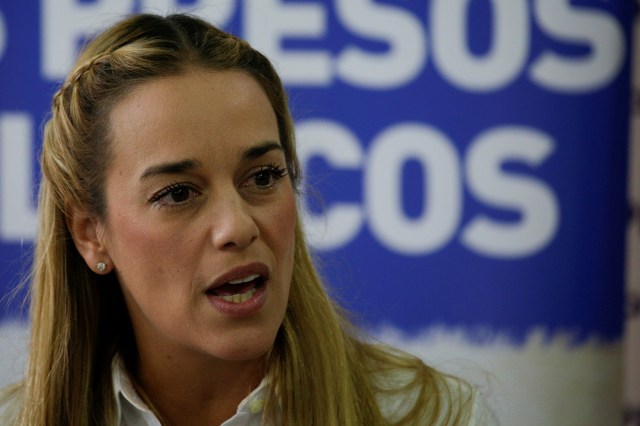 Lilian Tintori, wife of jailed Venezuelan opposition leader Leopoldo Lopez, speaks during a news conference in Caracas