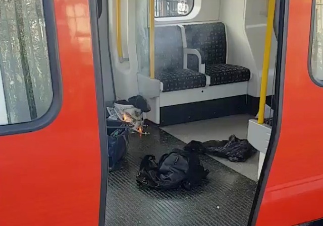 REFILE - CORRECTING TYPO Personal belongings and a bucket with an item on fire inside it, are seen on the floor of an underground train carriage at Parsons Green station in West London, Britain September 15, 2017, in this image taken from social media.   SYLVAIN PENNEC/via REUTERS  THIS IMAGE HAS BEEN SUPPLIED BY A THIRD PARTY. NO RESALES. NO ARCHIVES. MANDATORY CREDIT