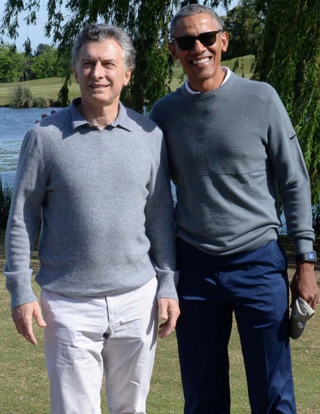 Argentina's President Mauricio Macri and former U.S. President Barack Obama pose for a photo at a golf course in Bella Vista, on the outskirts of Buenos Aires, Argentina October 7, 2017. Argentine Presidency/Handout via REUTERS ATTENTION EDITORS - THIS IMAGE WAS PROVIDED BY A THIRD PARTY.