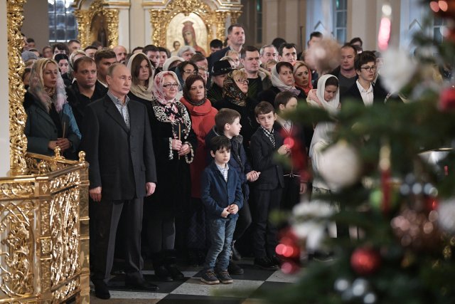 Russian President Vladimir Putin attends a service on Orthodox Christmas at the Church of Saints Simeon and Anna in St. Petersburg, Russia January 7, 2018. Sputnik/Alexei Nikolsky/Kremlin via REUTERS ATTENTION EDITORS - THIS IMAGE WAS PROVIDED BY A THIRD PARTY.
